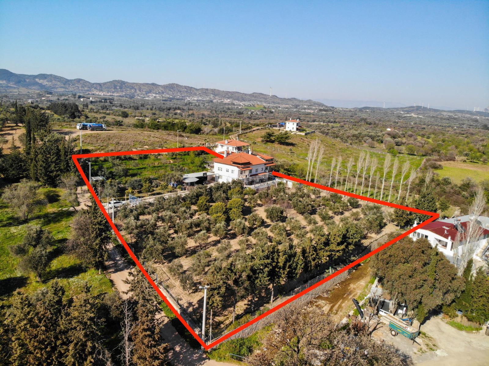 DATÇA'DA İÇİNDE APARTMAAN BULUNAN ARAZİ